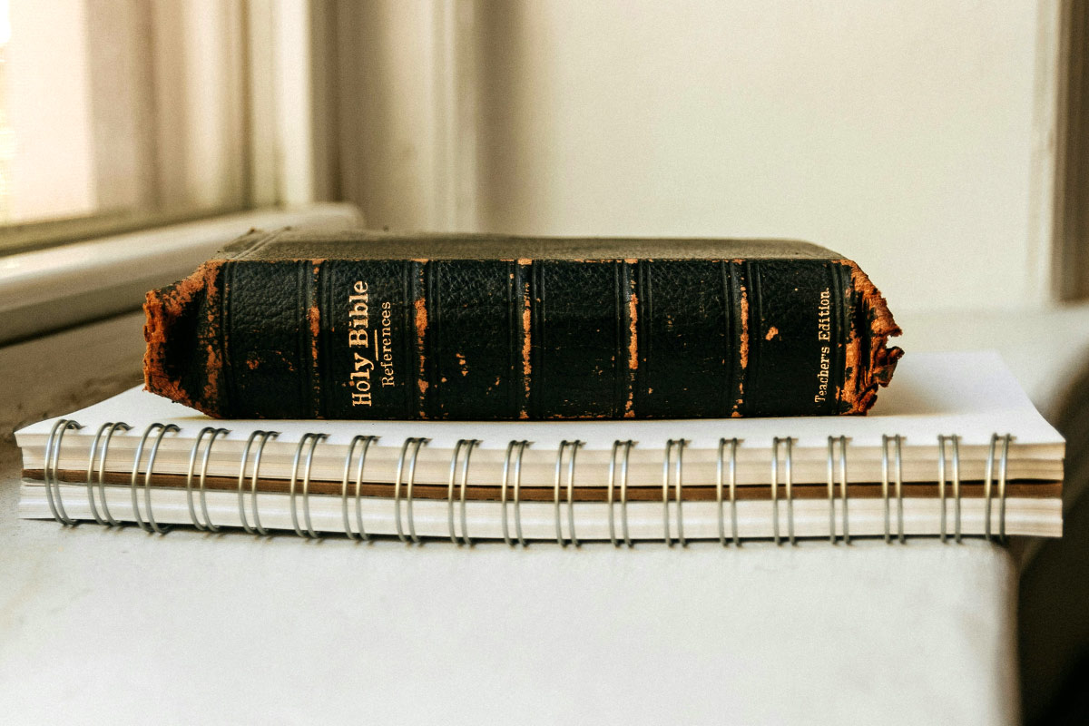 head to heart restoration ministry article image of a bible and a spiral bound notebook