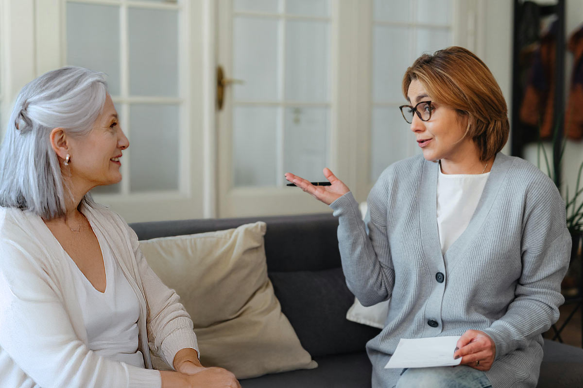 head-to-heart-restoration-ministry-grief-article-image-of-a-woman-sitting-on-a-sofa-with-a-counselor