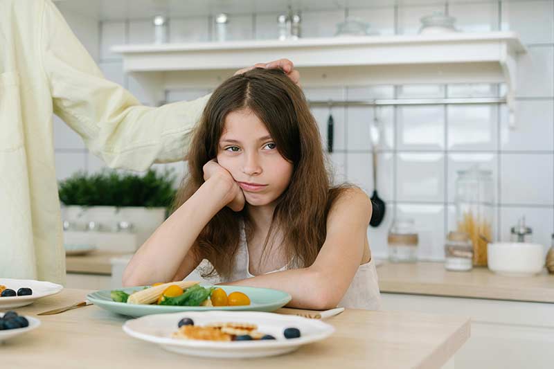 head-to-heart-restoration-ministry-christian-family-counseling-article-image-of-an-upset-girl-in-a-kitchen